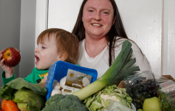 mum and child with veg box