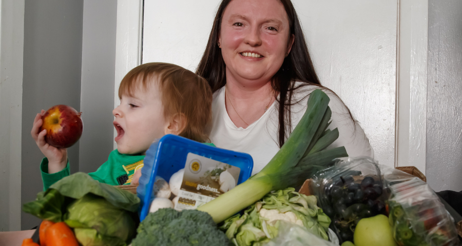 mum and child with veg box